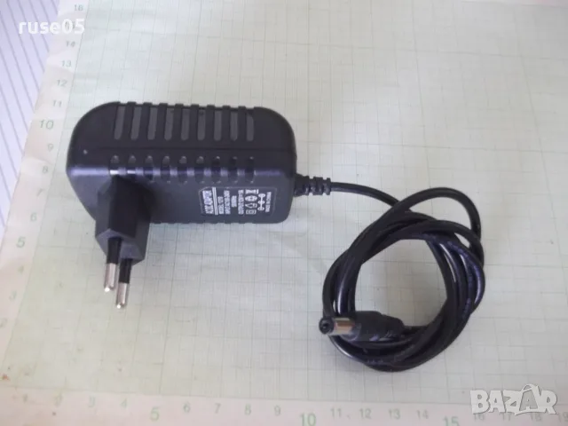 Адаптер захранващ "1210 - 12V , 1A" работещ