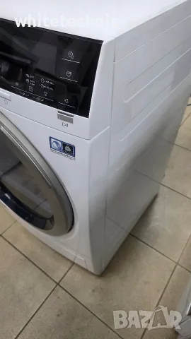Сушилня с термопомпа AEG T8DBE48S, снимка 4 - Сушилни - 56659864