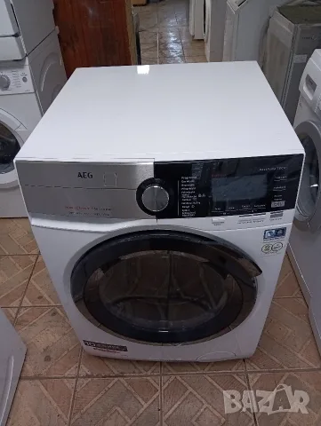 Като нова комбинирана пералня със сушилня с термопомпа Аег Aeg 9000 Series 10/6 кг 2 години гаранция