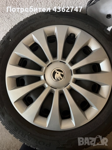 4 зимни гуми Barum 185/60 R15 с джанти и оригинални тасове Škoda Fabia
