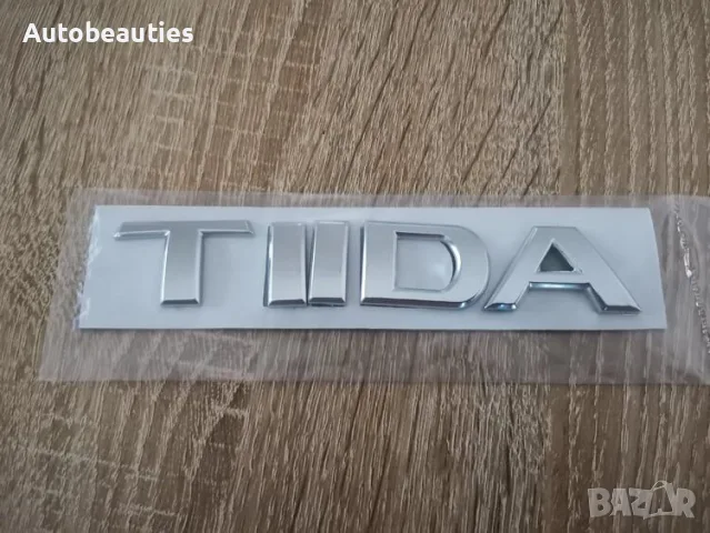 Надпис емблема лого Нисан Тийда Nissan TIIDA