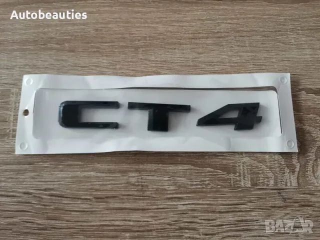 черно лого Cadillac CT4