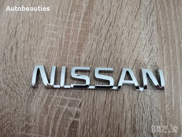 надпис лого Нисан Nissan