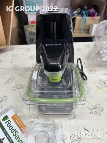 FoodSaver FFS010X – вакуум система с контейнер и пликове