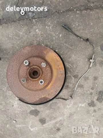 1834240 Преден десен шенкел с главина на колело Ford 4x108 mm, ABS 25 зъба за Ford Transit Courier
