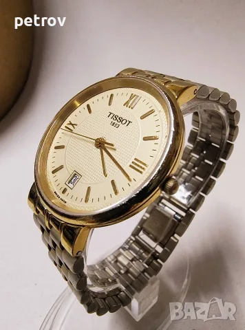 Часовник TISSOT Swiss made.