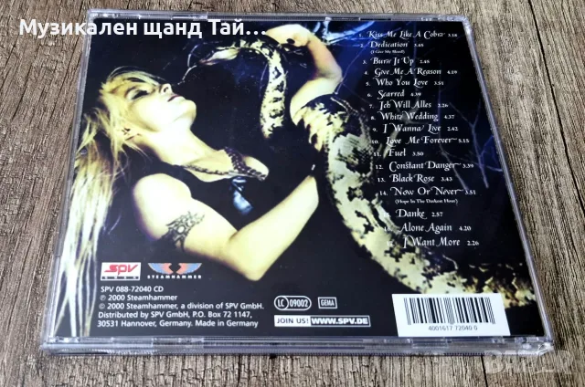Компакт Дискове - Рок - Метъл: Doro - Calling The Wild, снимка 2 - CD дискове - 56734269