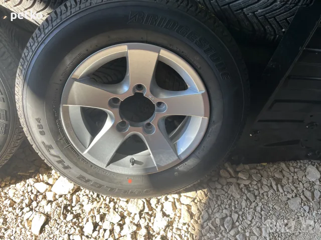 продавам 15 ки за сузуки Джимни , снимка 2 - Гуми и джанти - 56623333