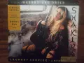 Shakira – Laundry Service: Washed and Dried (CD + Bon, снимка 1