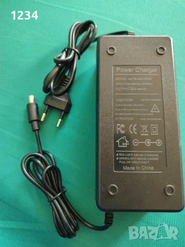 Зарядно за електрическа тротинетка Xiaomi M365 / Pro / 1S – 42V 2A (RCA 8mm букса)