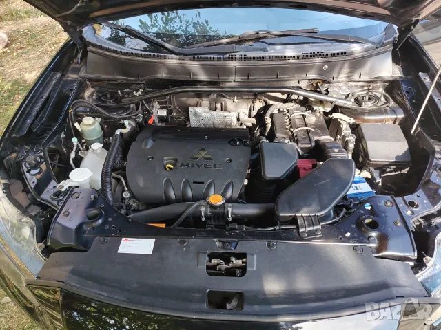 Mitsubishi Outlander 2.0  бензин, снимка 10 - Автомобили и джипове - 56585240