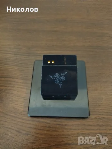 Продавам докинг станция (зарядно) за зареждане на мишка Razer Mamba