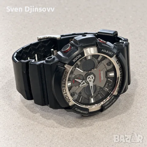 Мъжки часовник Casio G-Shock GA-200 – черен със сребрист ринг