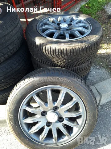 Алуминиеви джанти 15"; 4x100 за Mitsubishi с премиум зимни гуми 185/60 R15 (Bridgestone &amp; Kl