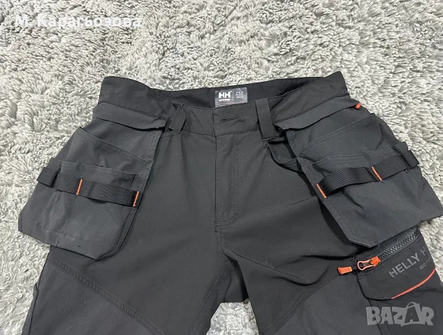 Helly Hansen Chelsea Evolution Construction Pant, Размер 52, снимка 4 - Панталони - 56735938